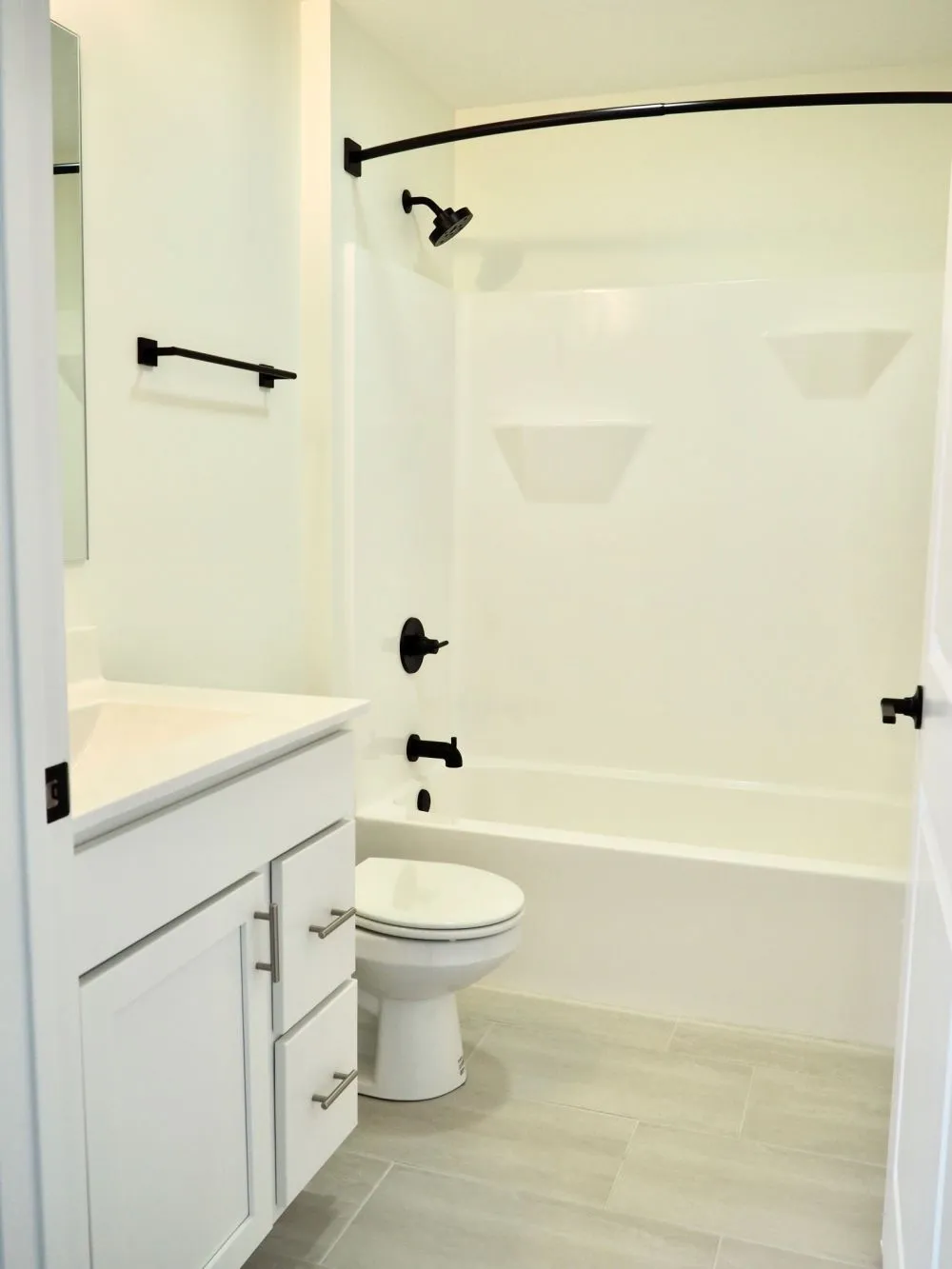 Shared laundry room with washers and dryers